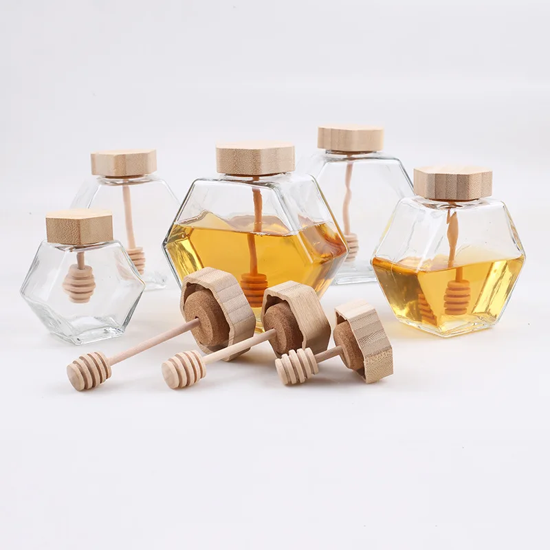 Wholesale Hexagon Shape Honey Pot Container with Wooden Dipper and Cork Lid Cover Honey Syrup Beehive Storage
