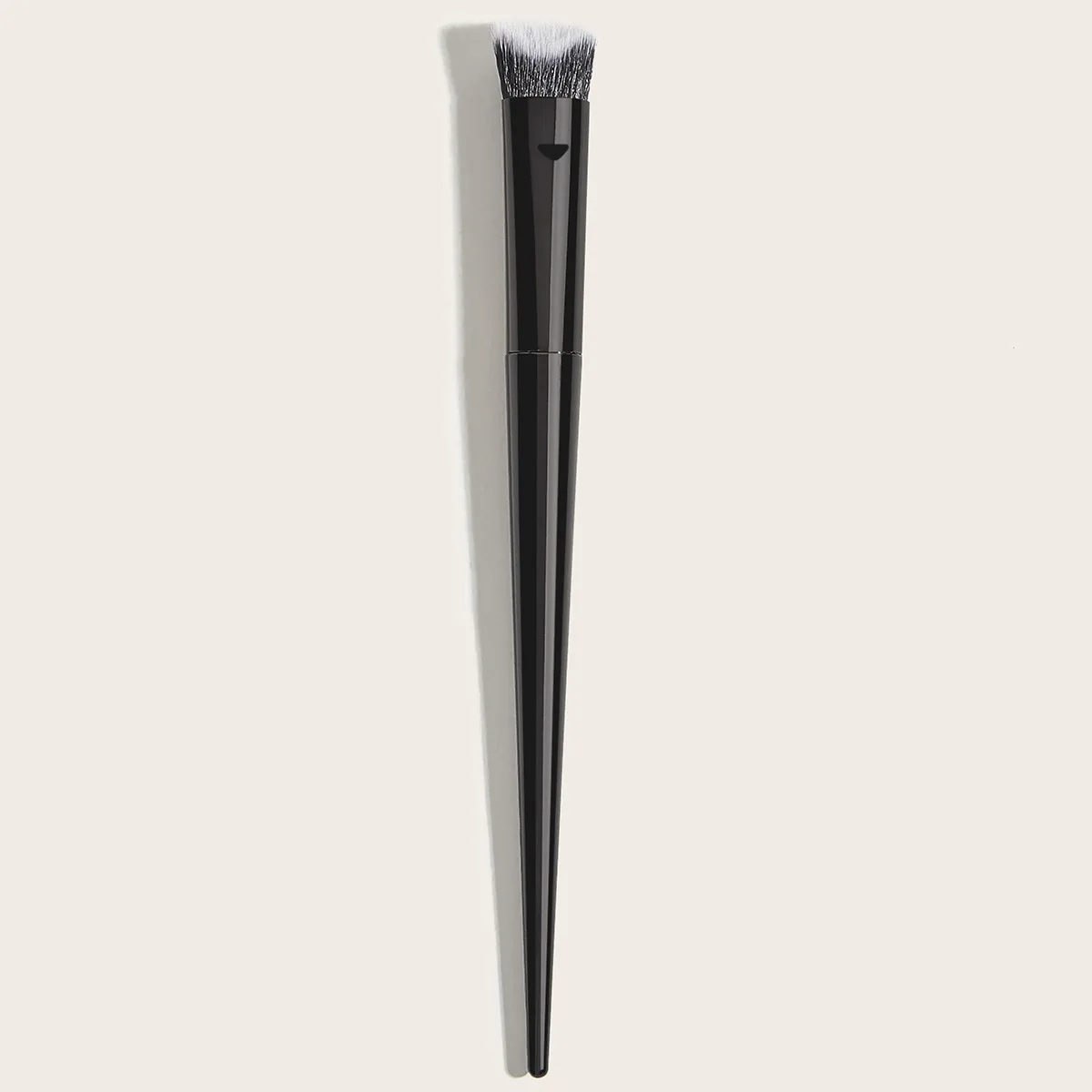 Single black wooden handle sculpting makeup brush