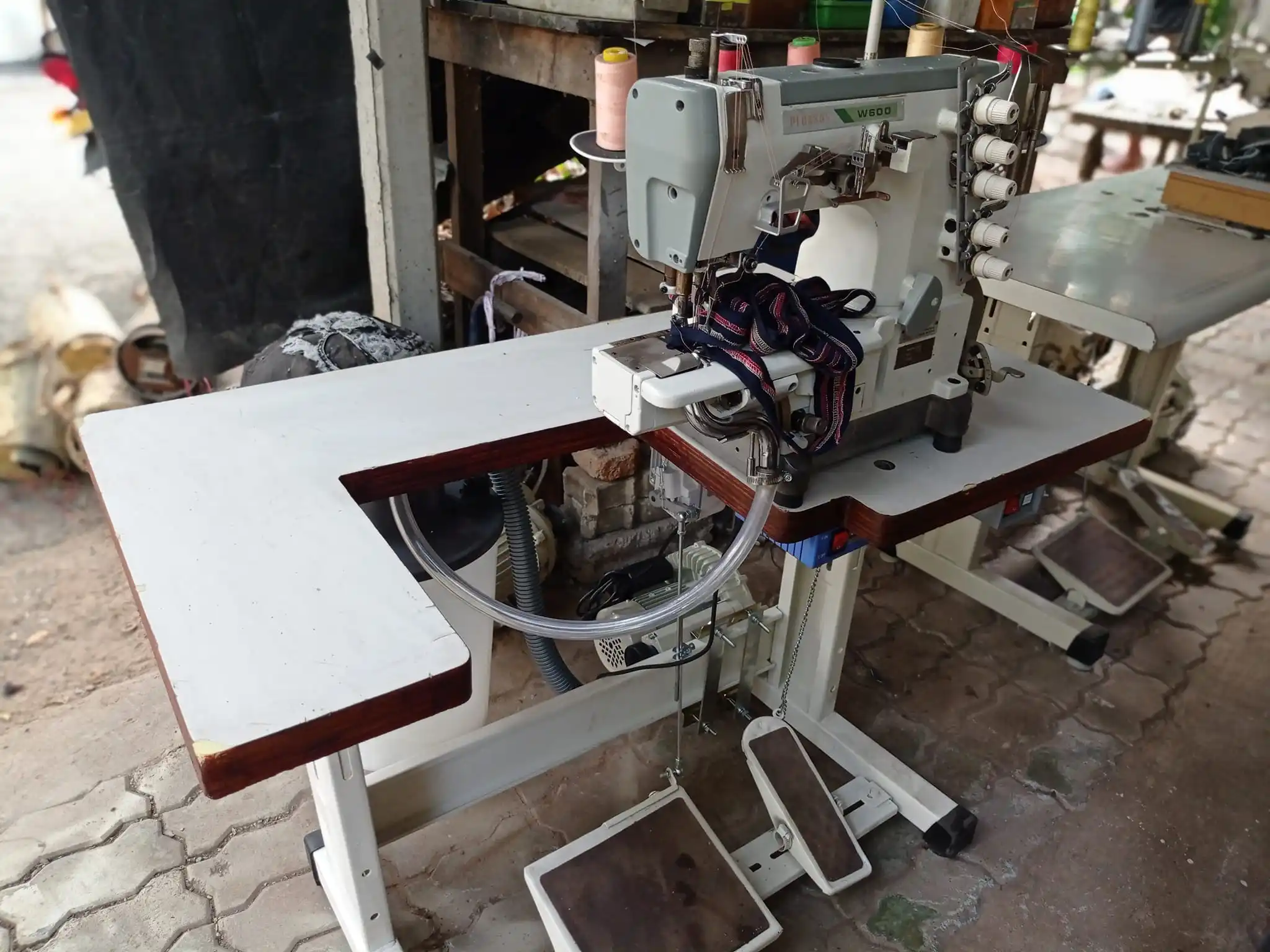 Up for Sale Used PEGASUS W600 3-needle 5-thread Industrial Cover Stitch Sewing Machine Good Working Condition