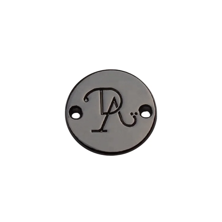 Wholesale stamped letter alloy round logos brand name metal tag label for kids clothing