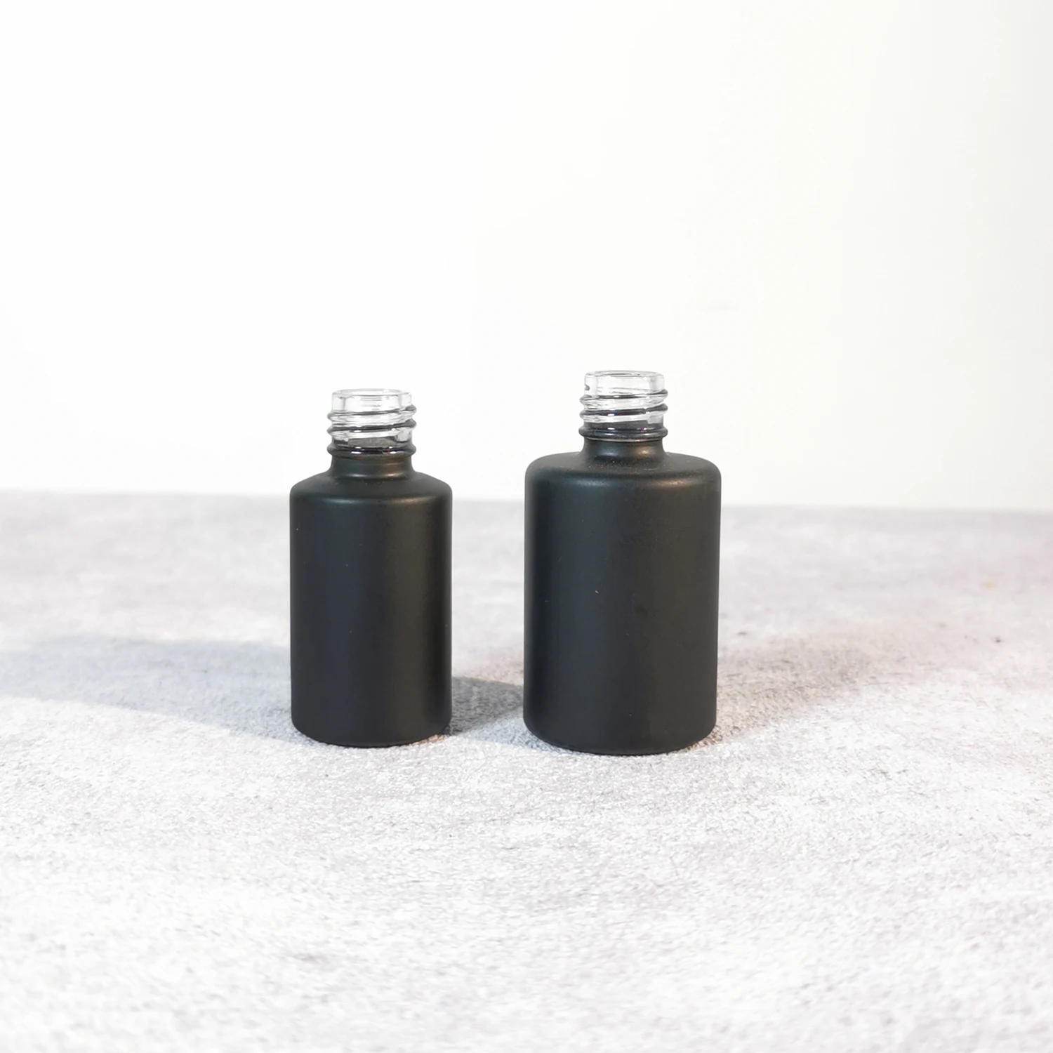 Hot selling 5ml 10ml cylinder frosted matte black empty glass uv gel nail polish bottle with brush and cap
