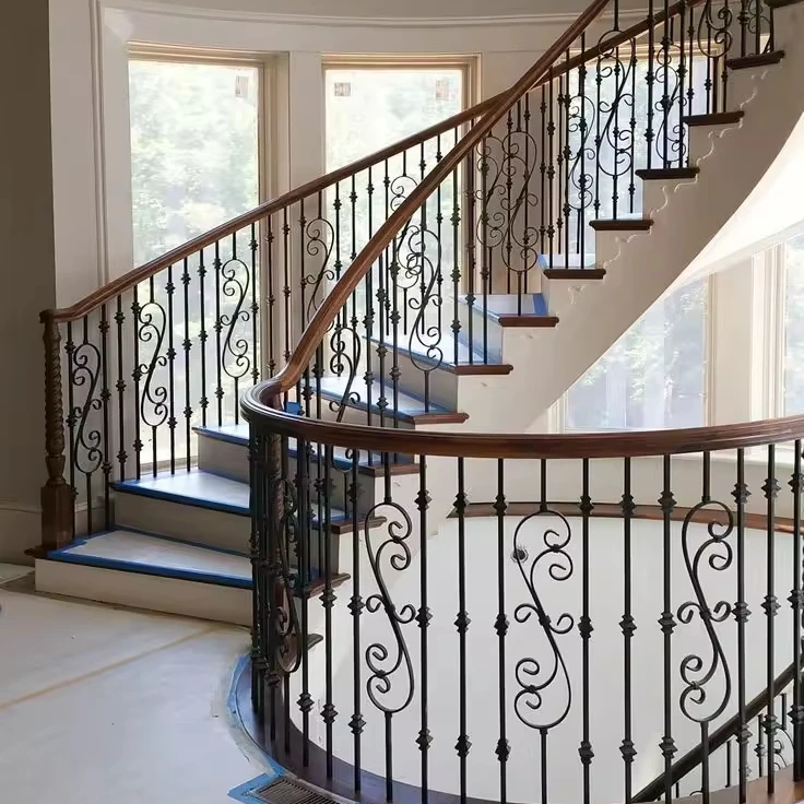 Luxury design curved stair marble/stone tread with wrought iron railing stairs from Foshan factory