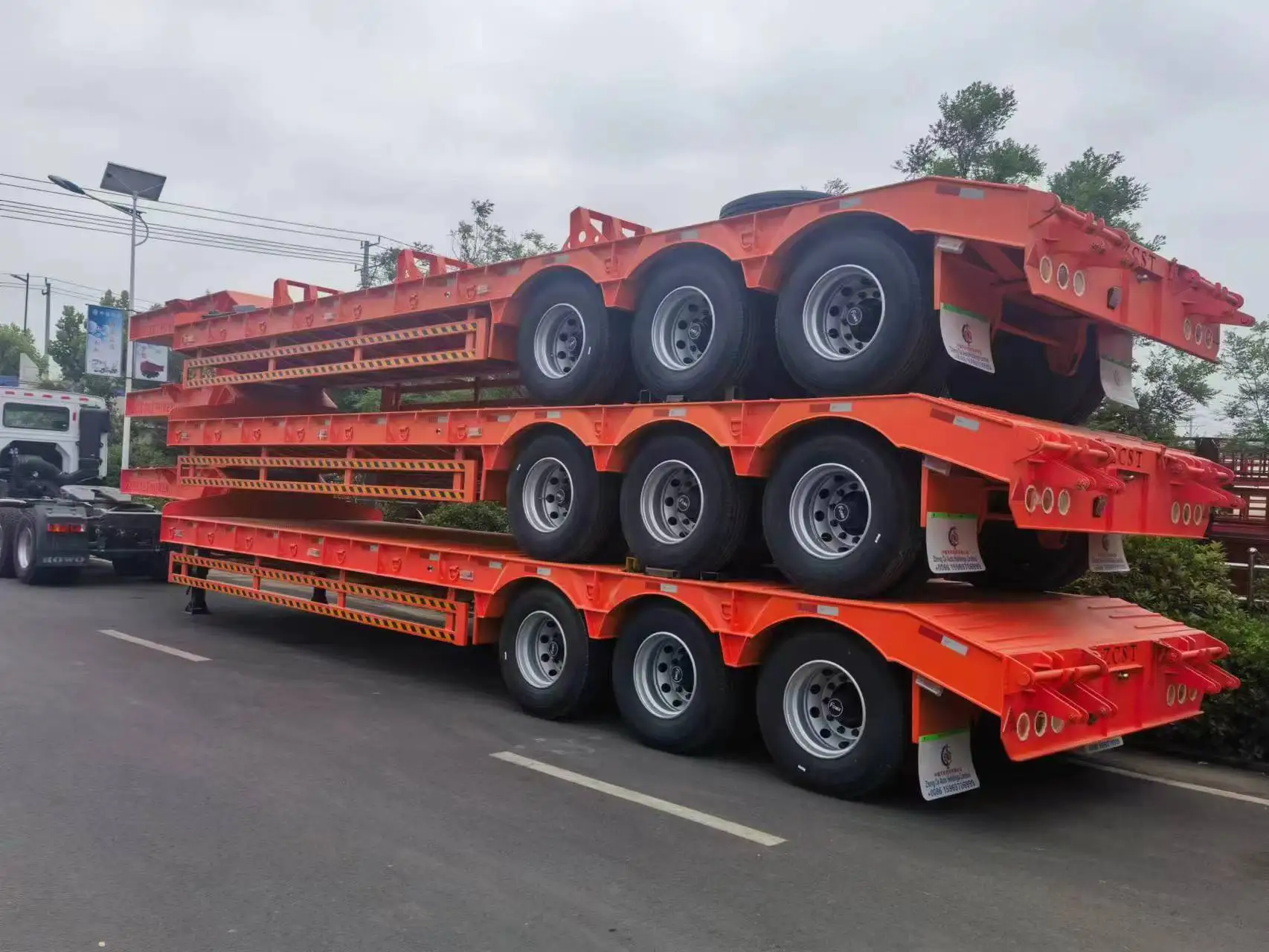 Factory Direct Price Chinese Brand Truck Trailer New 40 Ft 60ft Three Lines Six Axes Low Bed Flatbed Trailer