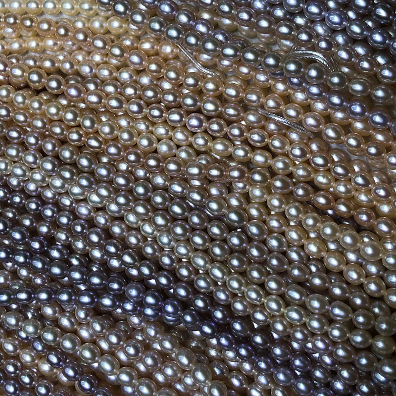 wholesale AAA rice pearl string, high luster, blemish free surface,full sizes and full colors rice pearl strand available