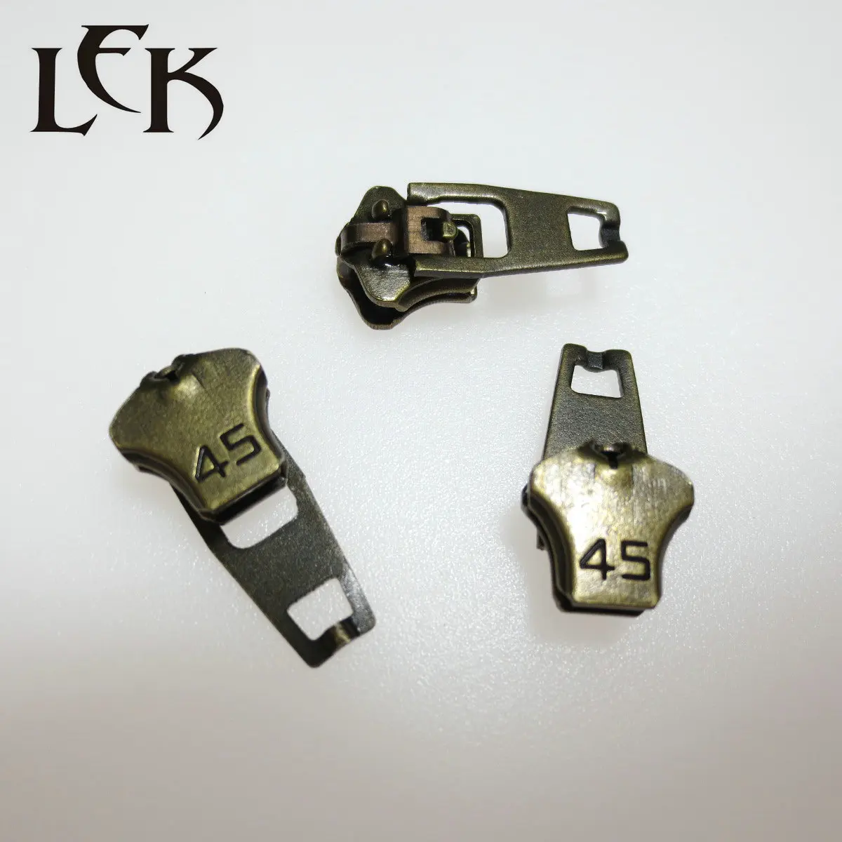 Hot selling professional manufacture lowest price antique brass 4.5YG iron slider zipper