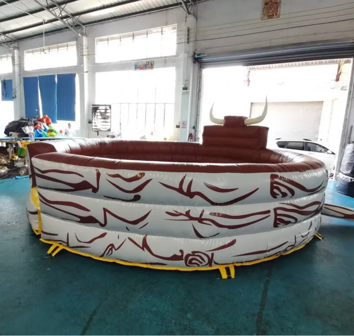 Mechanical Rodeo Bull With Inflatable Mattress Interactive Game In Amusement Park