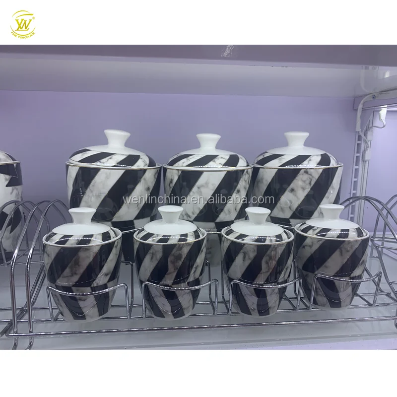 
Unique design kitchen used 7 pcs porcelain spice jar salt condiment canister set sugar pot with metal stand 