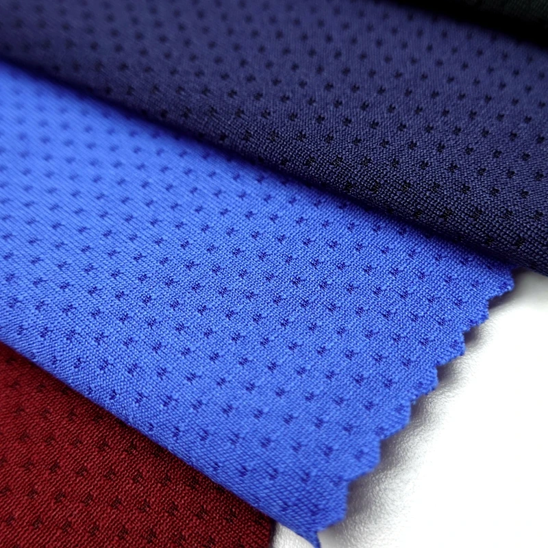 Quick dry 97/3 polyester spandex solid knit custom eyelet mesh jersey sports wear fabric for tshirts