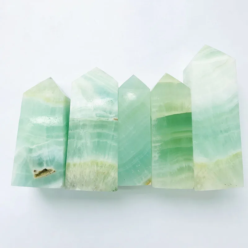 Wholesale high quality natural crystal points hand carved caribbean calcite four face towers for decoration