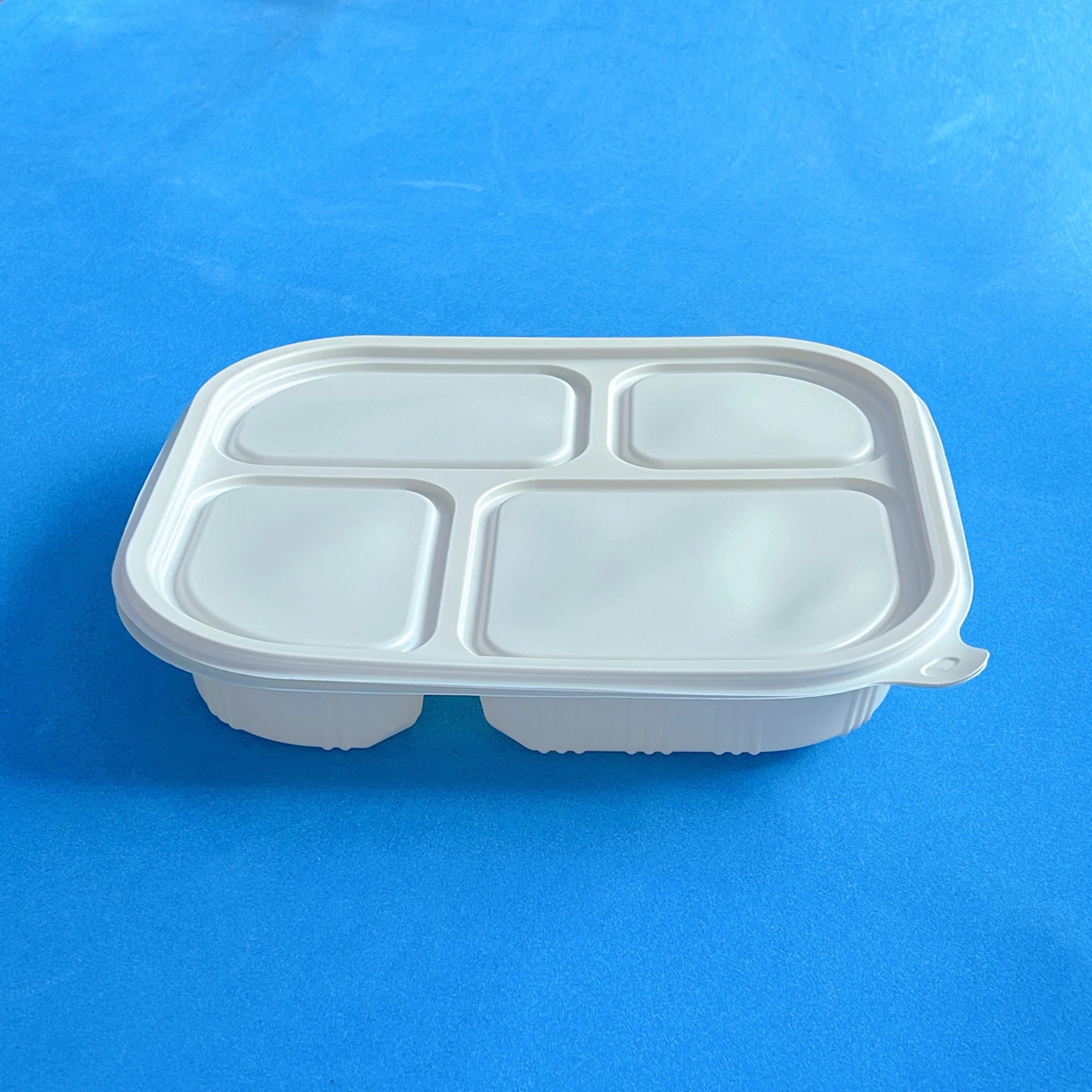 Disposable degradable corn starch four box with lid fast food box can be customized