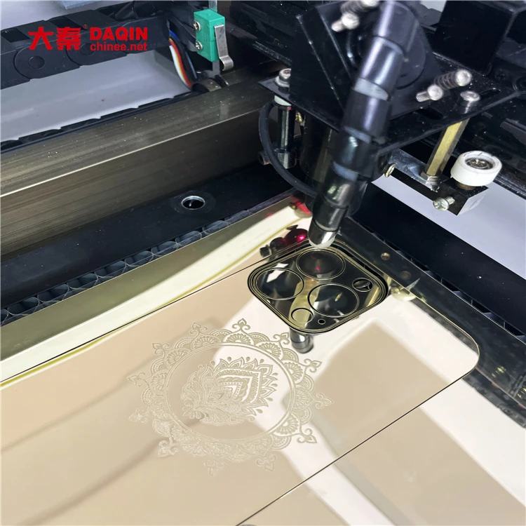 cut Gold engraved back skin by daqin laser screen protector Cutting machine