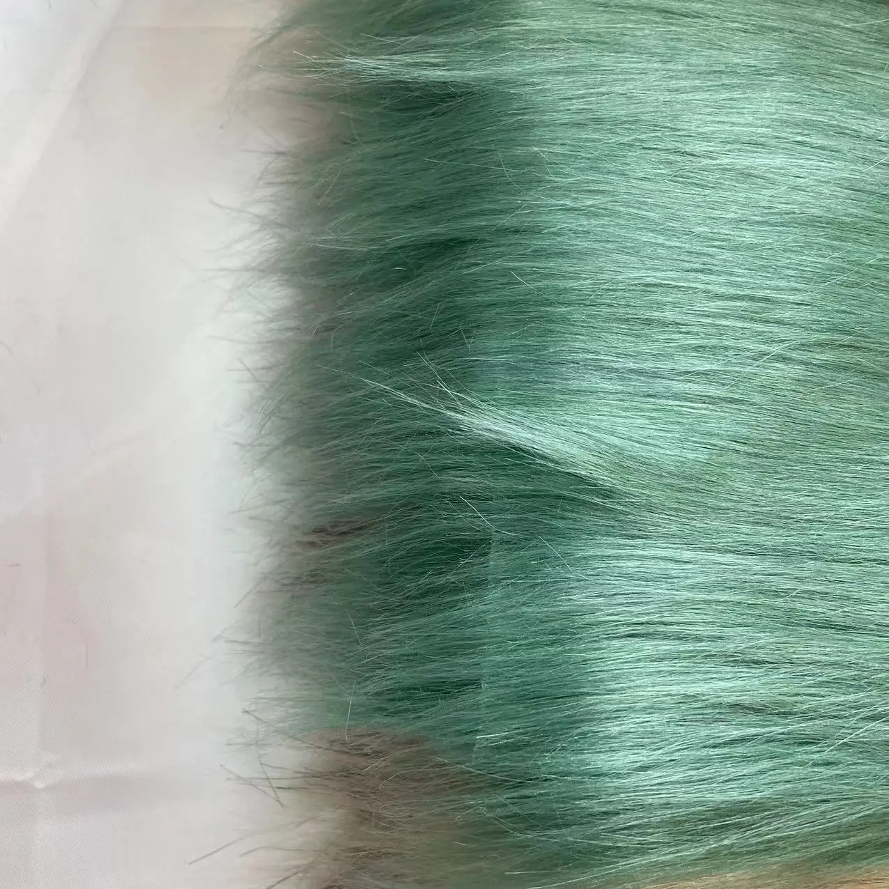 China Manufacturer artificial long hair pile plush faux fur fabric for toy and clothes