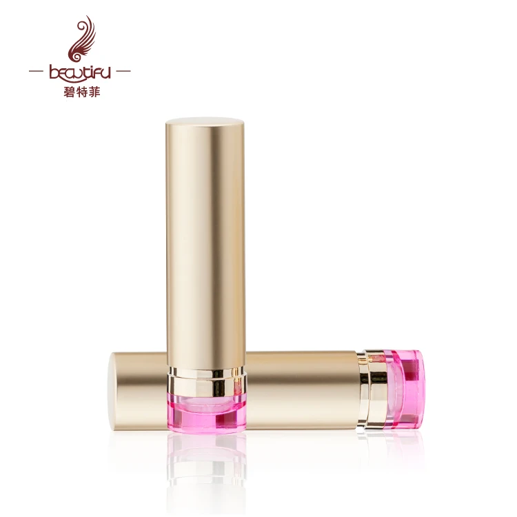 Empty spectaculargold aluminum lipstick case/container/tubes/packaging with a pink base to display color of lipstick