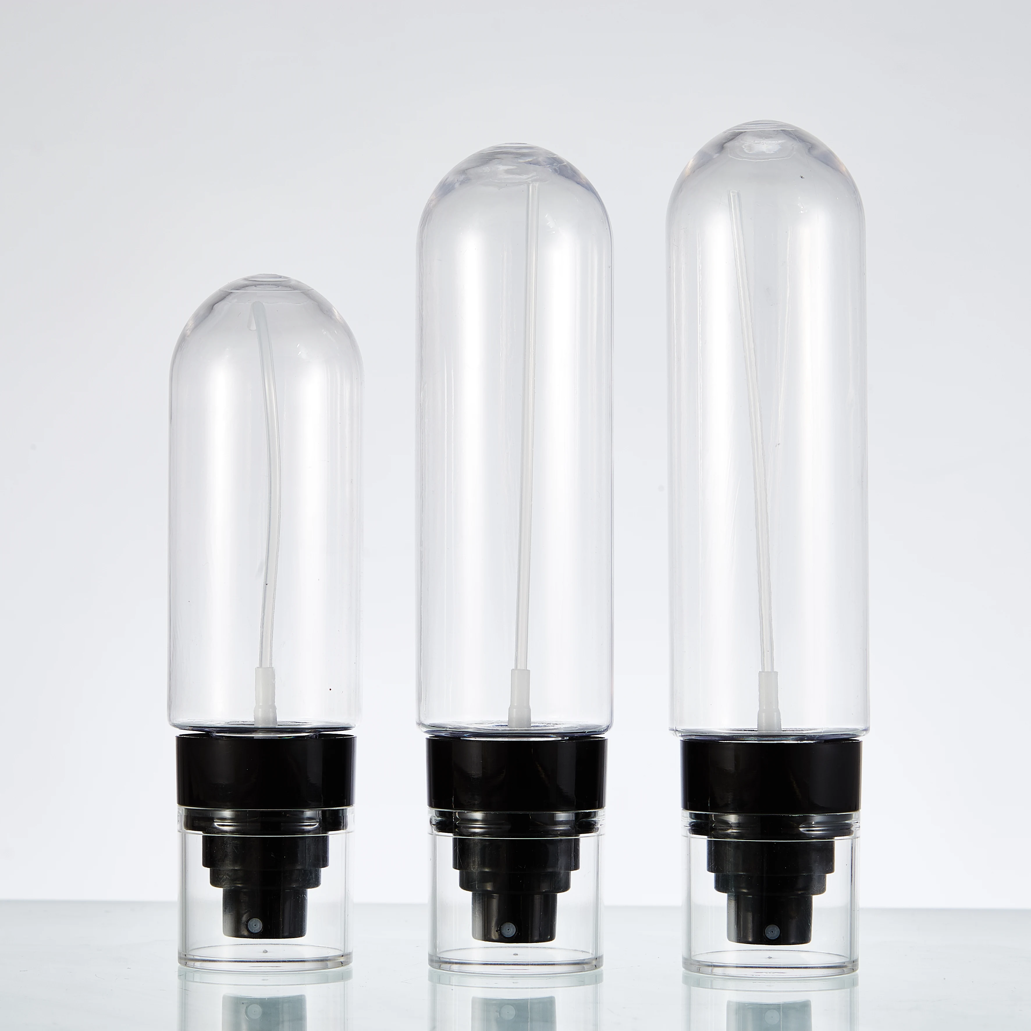 Free Samples Travel Plastic Bottle Round Bottom 80ml 100ml 120ml Cosmetics Spray Bottle With Pump Dispenser Manufacturer