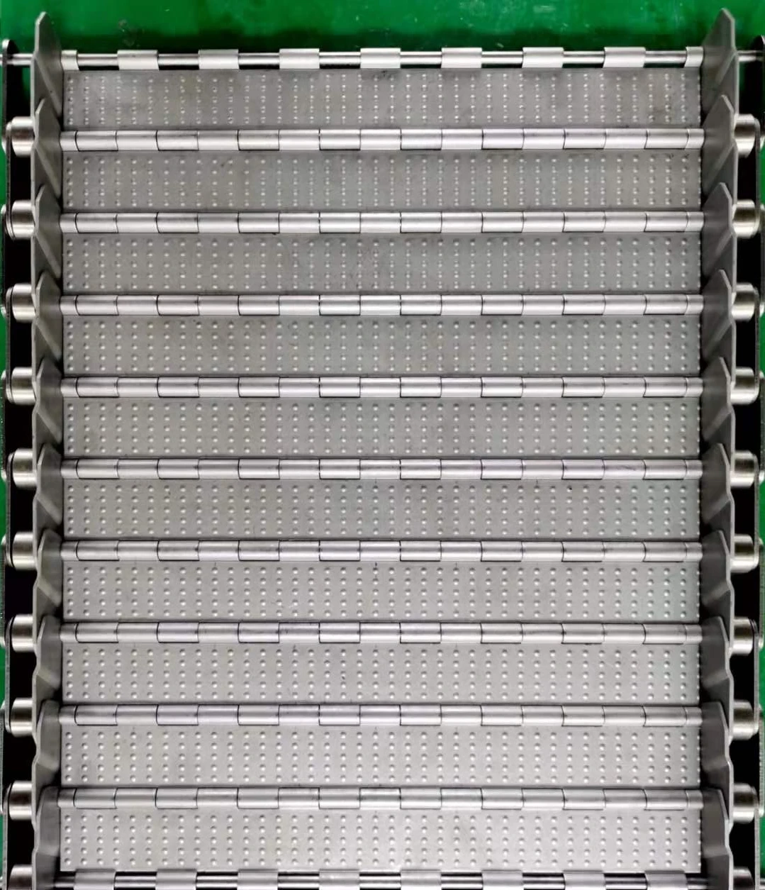 Chip removal conveyor chain