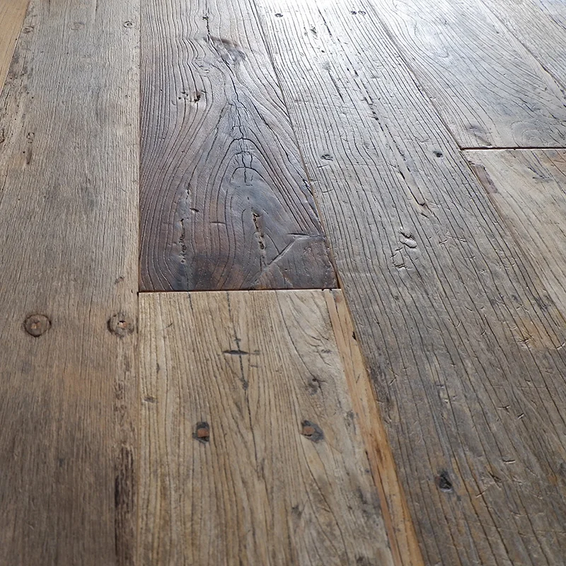 Reclaimed herringbone hardwood parquet flooring