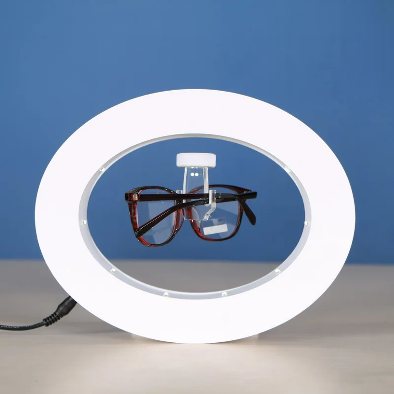 Hot levitating sunglasses display magnetic floating eyeglasses stand display rotating sun glasses shop display stand rack