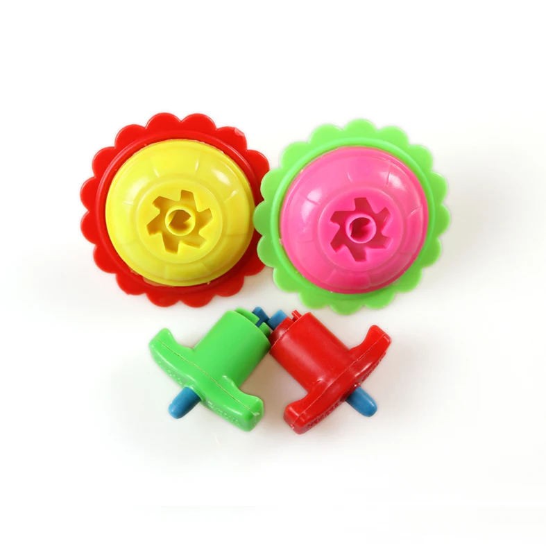 Wholesale Cheap Mini Plastic Winding Pinner Top Toy Import From China