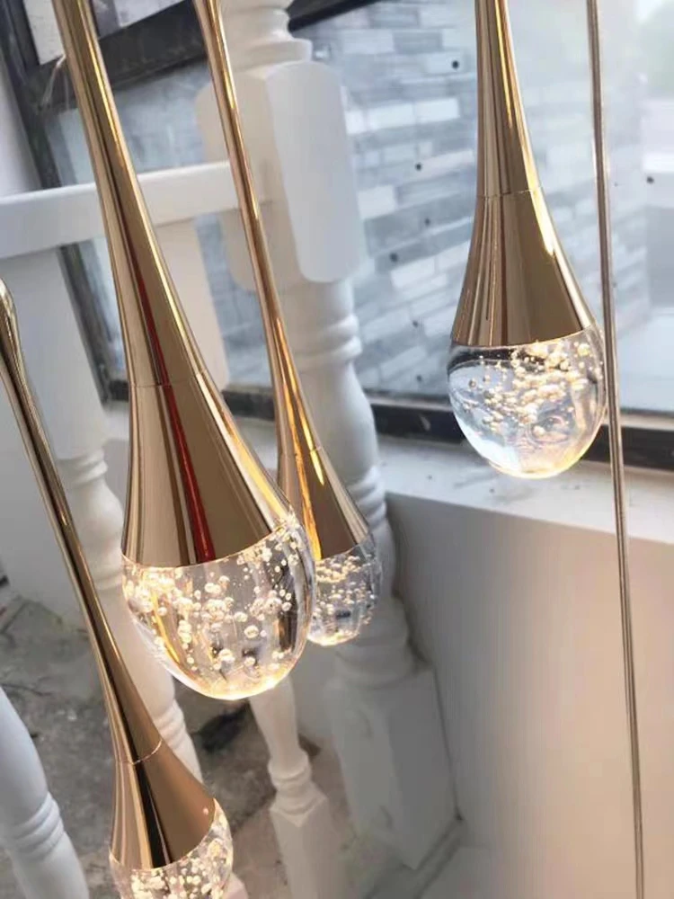 Modern simple long gold raindrop crystal chandelier pendant lamp for duplex villa staircase living room