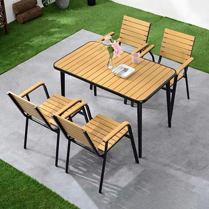 Modern and minimalist courtyard garden open-air terrace balcony outdoor plastic wood tables and chairs