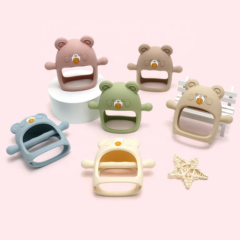 Wholesale Food Grade Sensory Autism Kids Anti-dropping Teething Glove Chew Toy Baby Wrist Silicone Teether For Baby