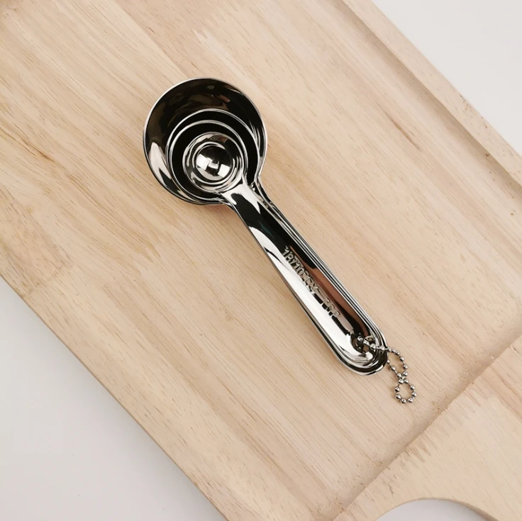 Stainless steel cake baking 1/2 tsp, 1/2 tsp, 1tsp  1 tbls  measuring spoon 4 pieces kit measure spoon measuring scoop