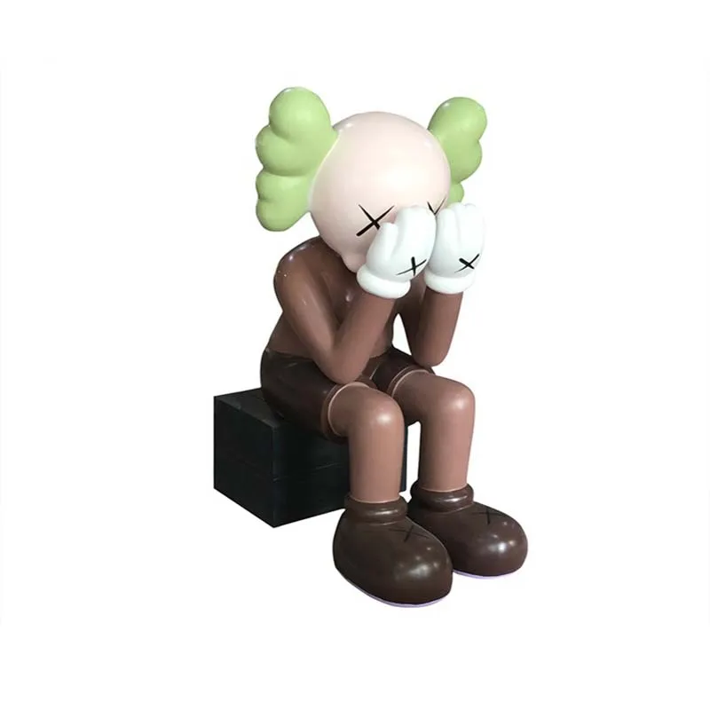 A violent bear resin sculpture adorns the entrance to the mall