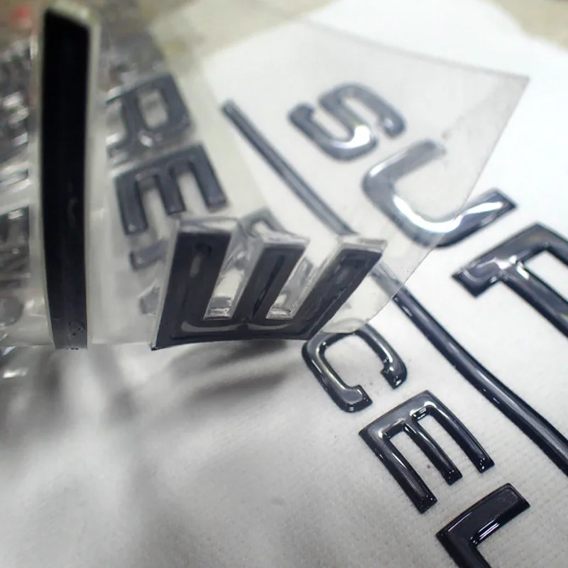 Factory Custom High Quality Golden TPU Heat Transfer Sticker Soft 3D Embossed Patches Badges for Garments