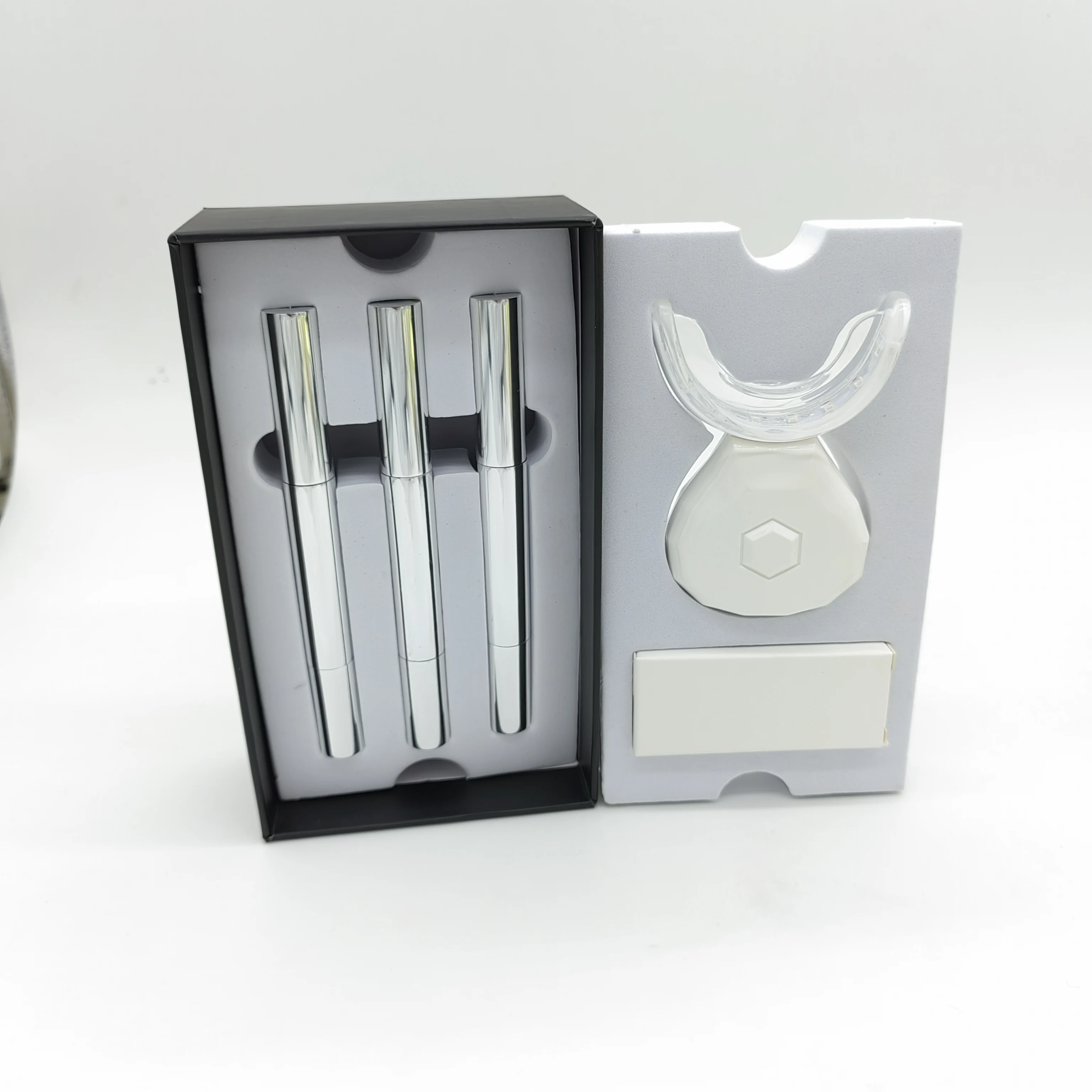 2022 High quality colorful food grade home led teeth whitening kit .
