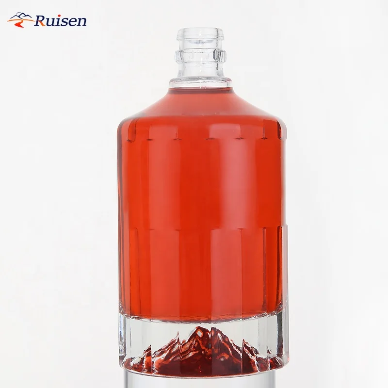 International Standard Round Shape Concave Convex Bottom And Embossed Round Logo Rum Gin Spirit Bottle