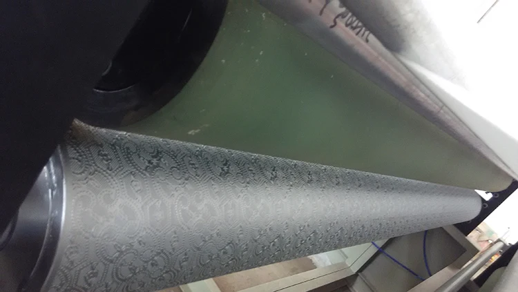 Automatic high speed rewinding embossing toilet tissue roll paper machine