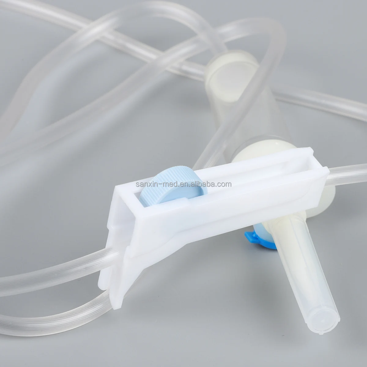 IV fluid flow regulator extension set