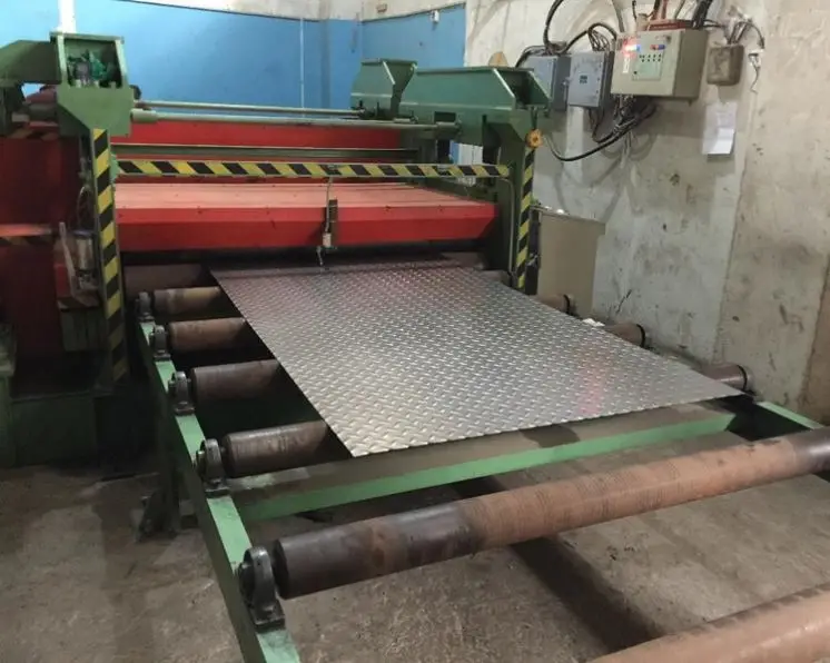 Checker plate embossing machine