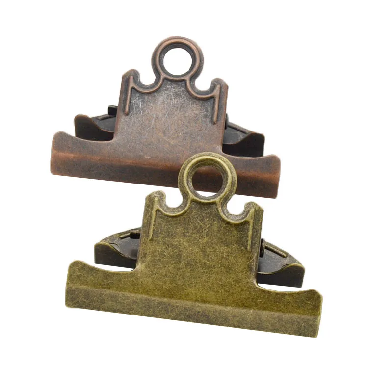 Factory manufacturers wholesale different styles and colors of metal lever clip hot bronze plate clip