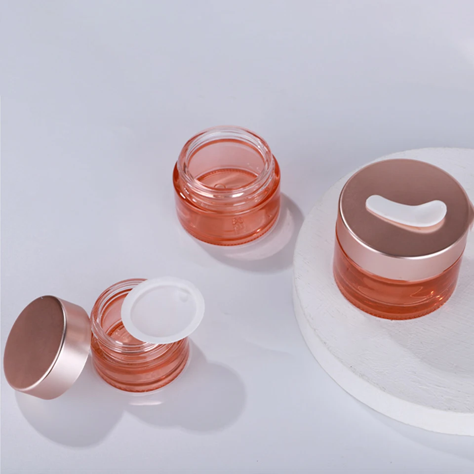 New product 5g 10g 15g 30g 50g 100g  clear pink glass cream jar with gold black sliver aluminium Cap Luxury skincare packaging