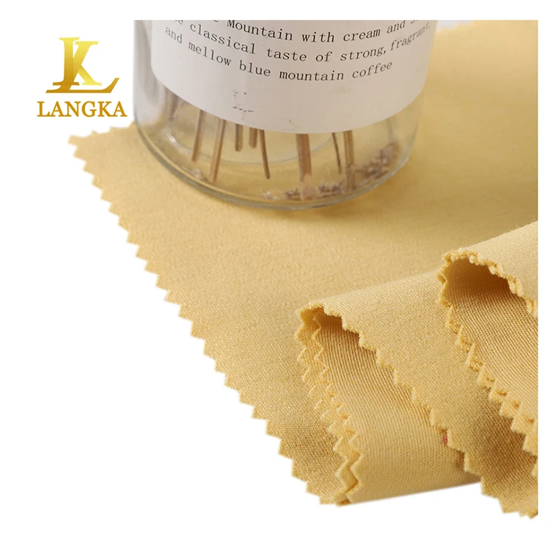 Langka china shaoxing textile stocklot plain dyed knitted 100% cotton combed interlock fabric for apparel