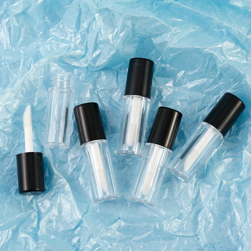 Round matte lip gloss tube transparent clear with black top , empty plastic cosmetic lip gloss tube small custom logo