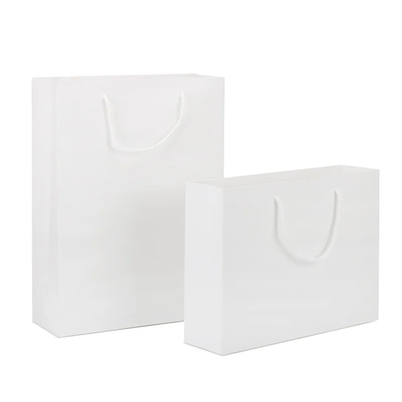 YC New Design Cheap Price Luxury White Cardboard Kraft Shopping Craft Gift Paper Bag With Handles Recyclable Custom Logo