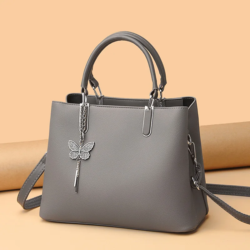 2023 Hot Sell Classic Elegant Style Plain Butterfly Decoration Embossed Litchi PU Leather Tote Shoulder Bag Handbags