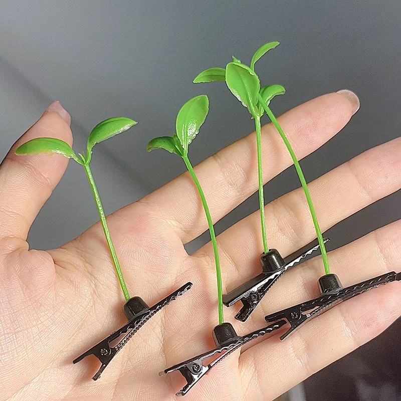 Продажа милых артефактов чтобы сделать забавные маленькие ростки фасоли с прорастанием травы на голове