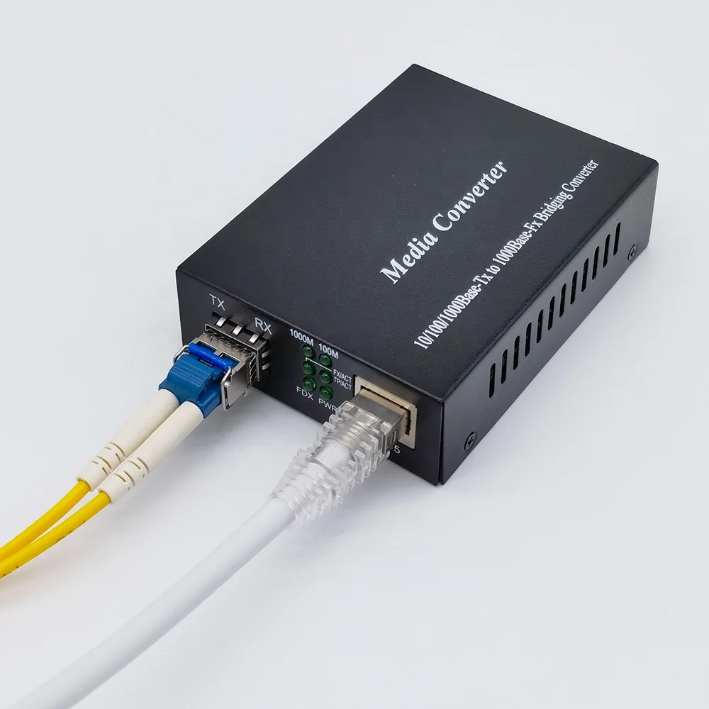 10/100/1000Base-T RJ45 to 1000Base-X SFP Slot Gigabit SFP to RJ45 Fiber Media Converter