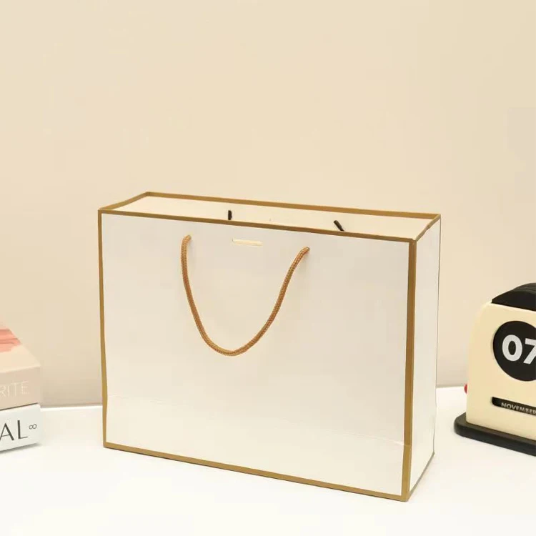 Customized Designer Logo Printed Shopping Paper Bag Luxury Packaging Bags for Gift Wrapping