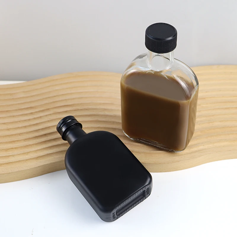 New Design 100ml 200ml 250ml 300ml Clear Beverage Packing Cold Brew Coffee Whisky Glass Bottles For Liquor Tea