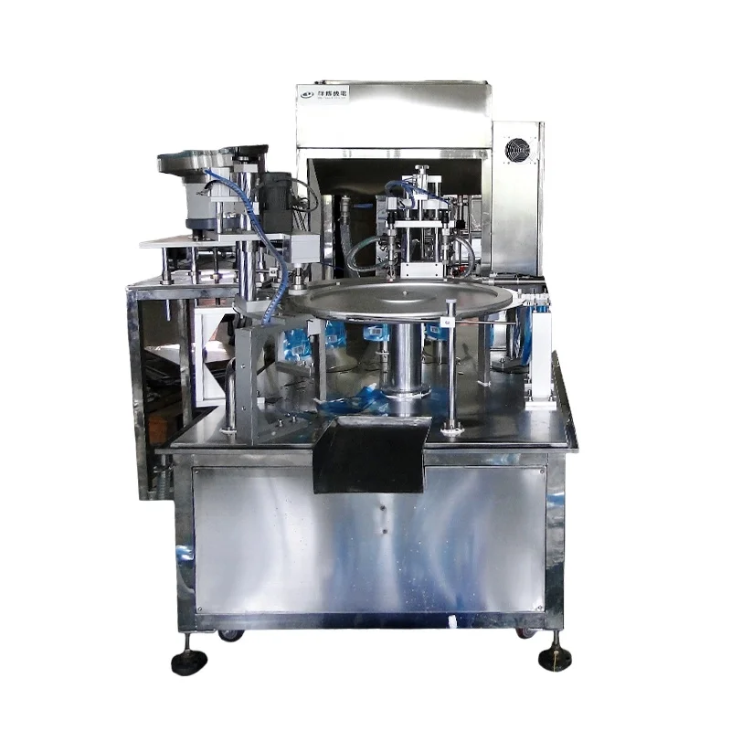 two-pipe nozzle bag filling and capping line of Xiangbo Machinery, filling and sealing the liquid or paste of the