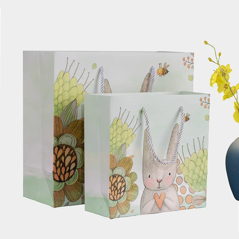 Custom logo printed good quality shopping packing cheap paper bag children toy paper bag with ribbon