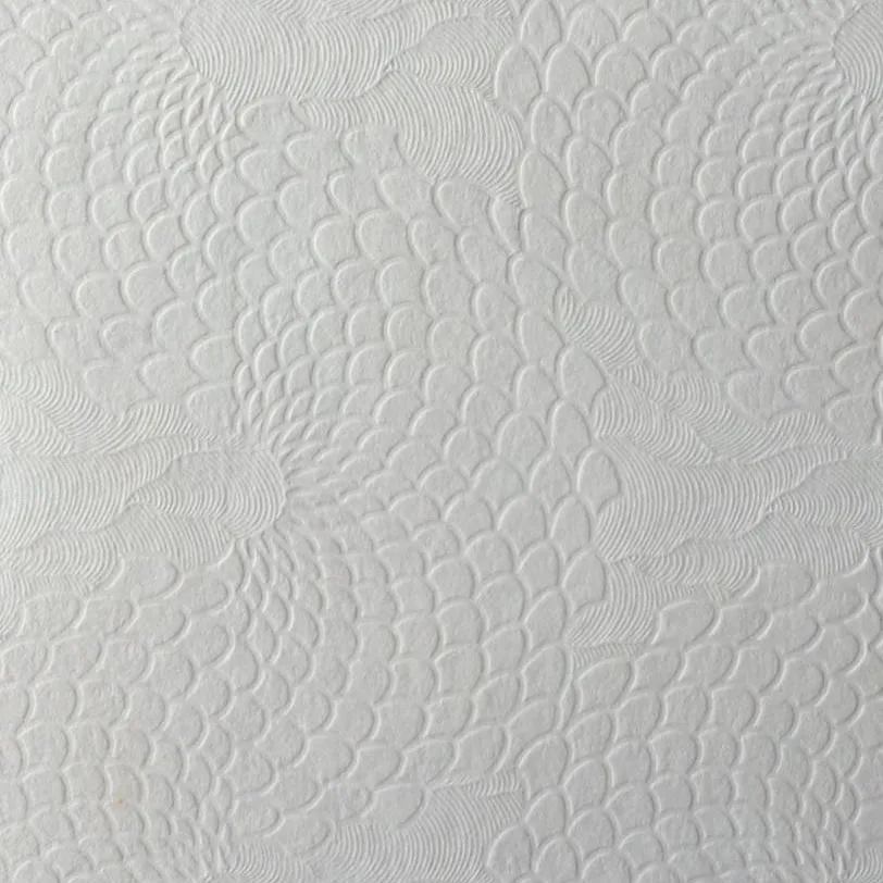 Embossing machine for embossing patterns on paper surface