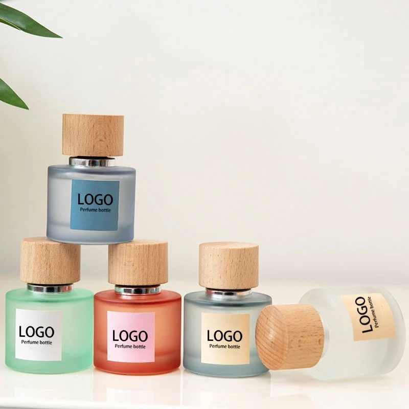 Design Luxury Custom LOGO Fragrance Pump Spray 50ml Round Sprayer Empty Oil Glass Perfume Bottles Packaging