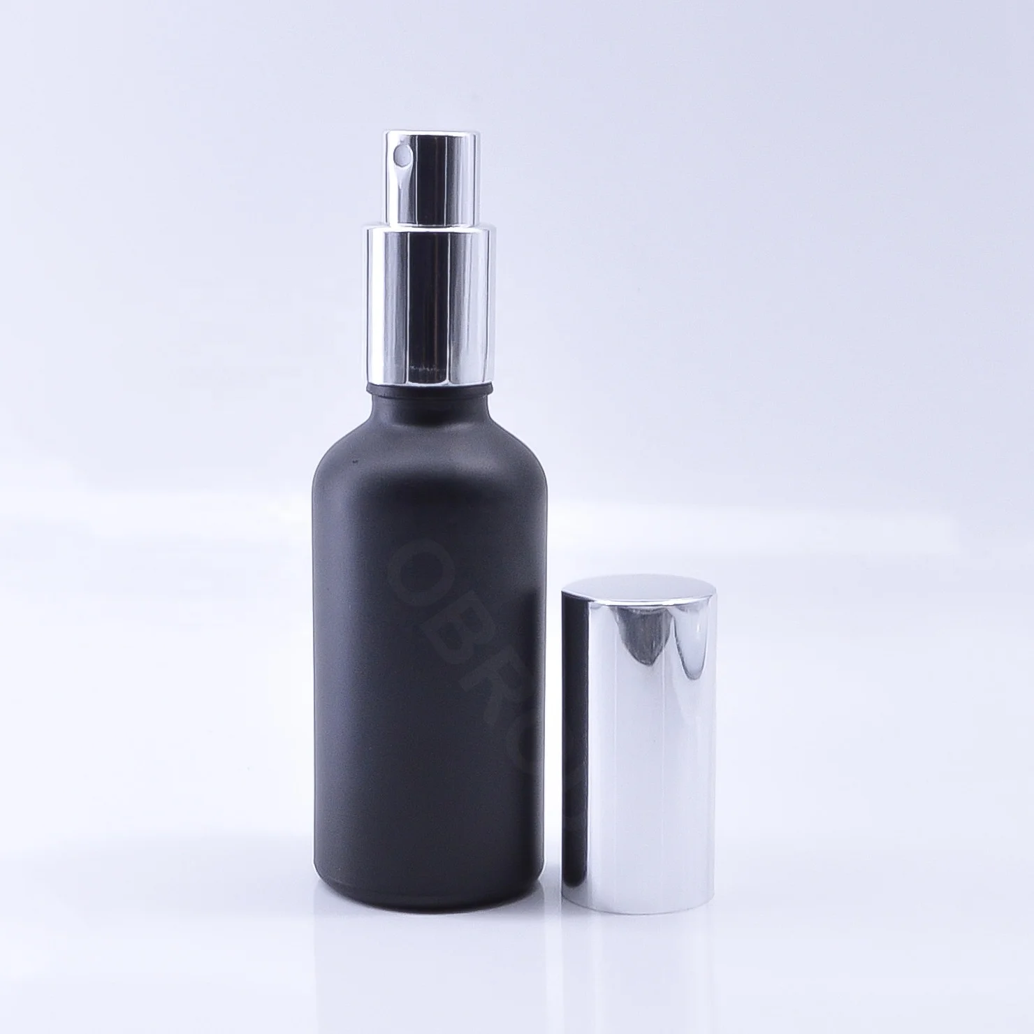 Cosmetic round matte black 30 50 100ml fragrance oil glass perfume bottle with spray pump cap
