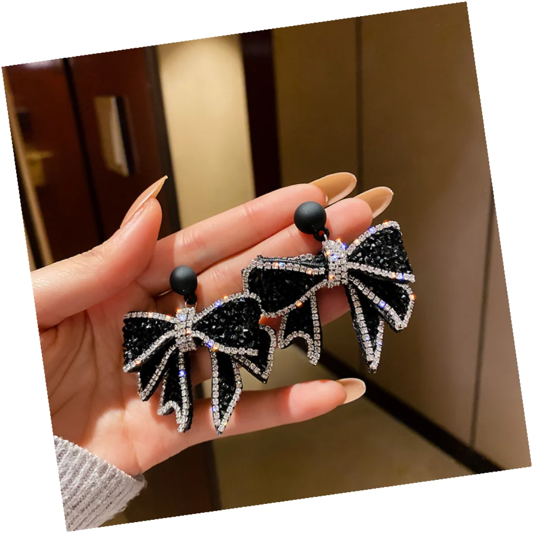 Женские серьги с бантом