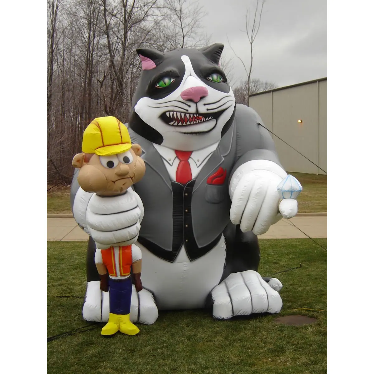 Giant Inflatable cat with construction worker and money bag in hands Inflatable Fat Cat Chokes Union Workers